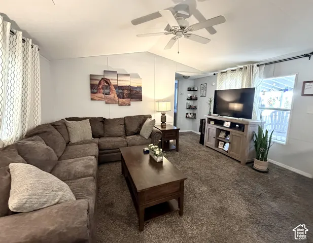 Spacious, open living area featuring vaulted ceilings