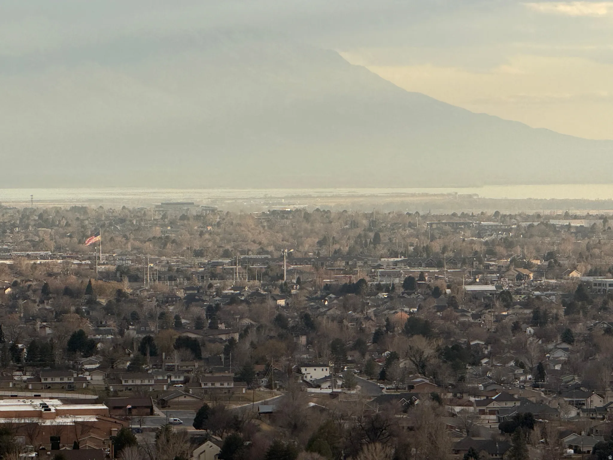 Expansive aerial perspective showcasing a significant residential and urban landscape
