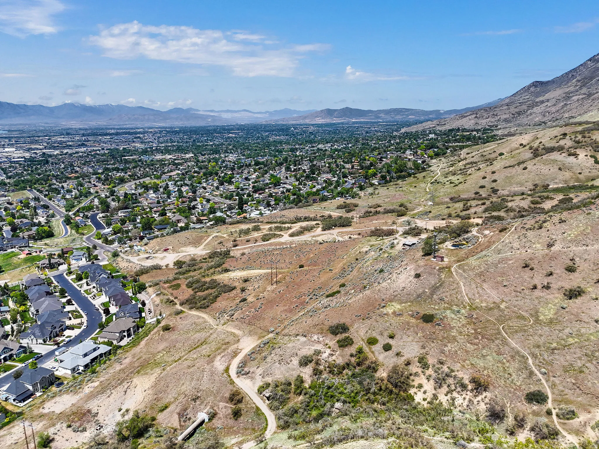 Expansive mountain terrain with visible pathways