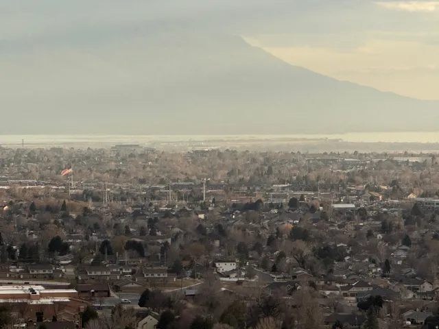 Expansive aerial perspective showcasing a significant residential and urban landscape