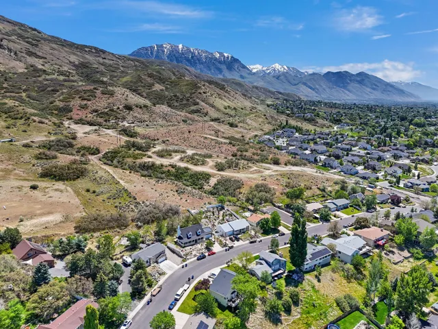 Expansive mountain backdrop with snow-capped peaks