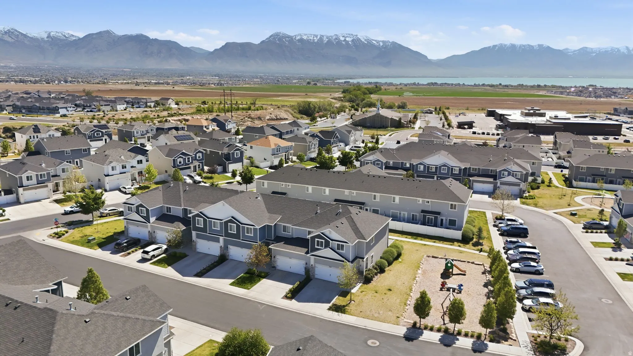 Residential community featuring varied architectural styles and a playground area
