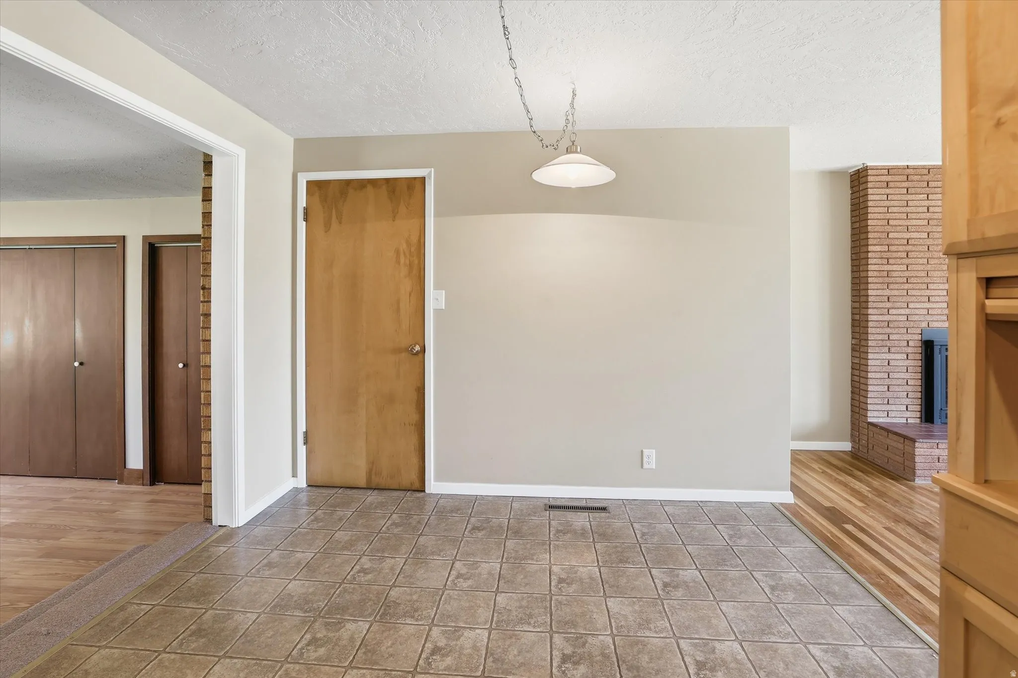 Tile flooring with an overhead light fixture