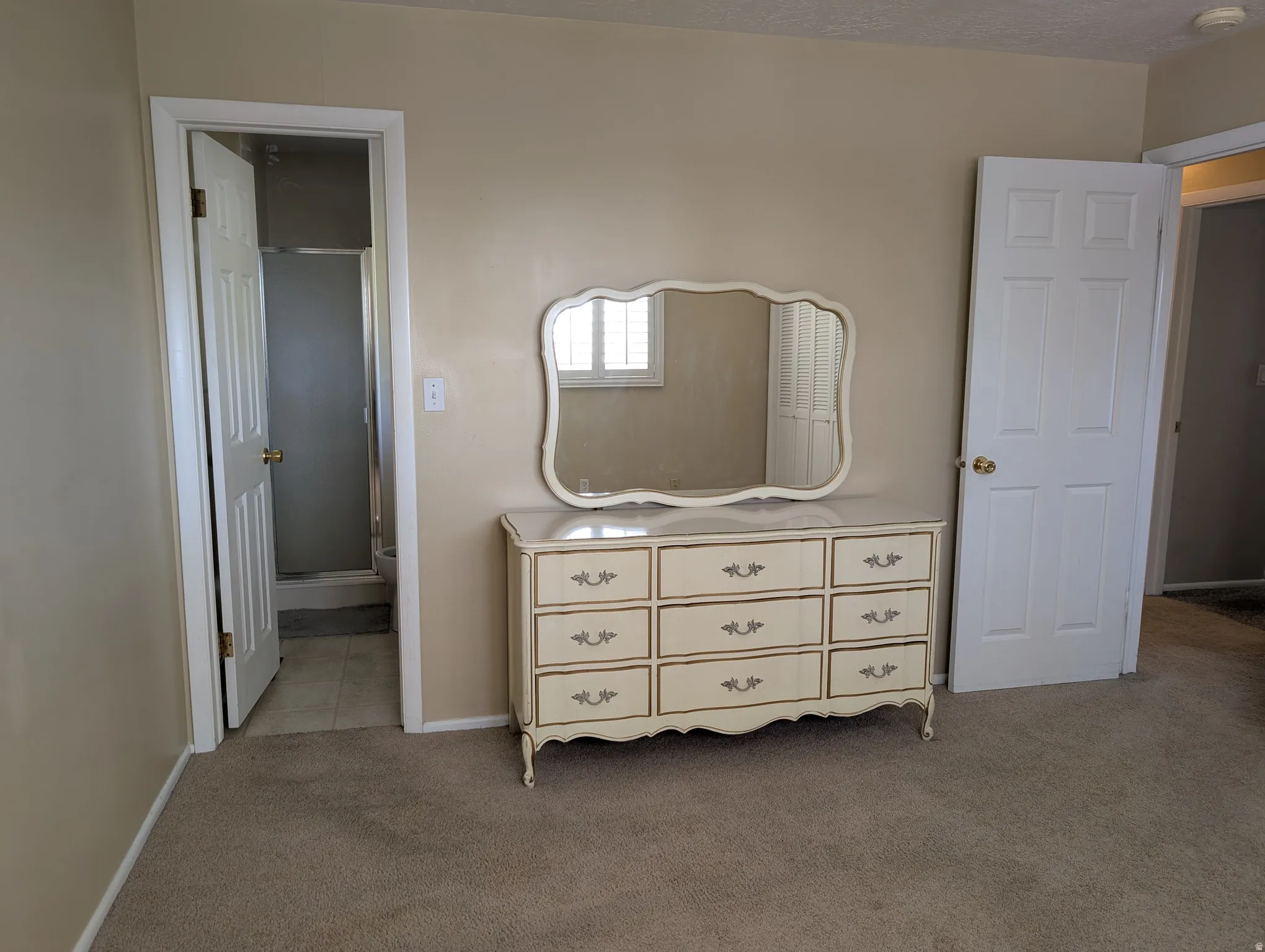 Master bedroom with adjoining master bathroom