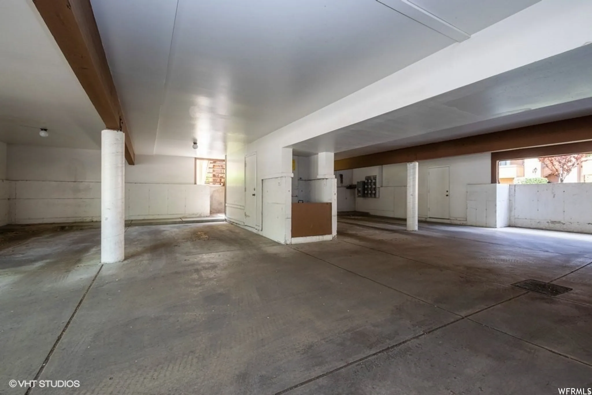 Parking Spot is left of center garbage cubby. Storage is on left wall of cubby.