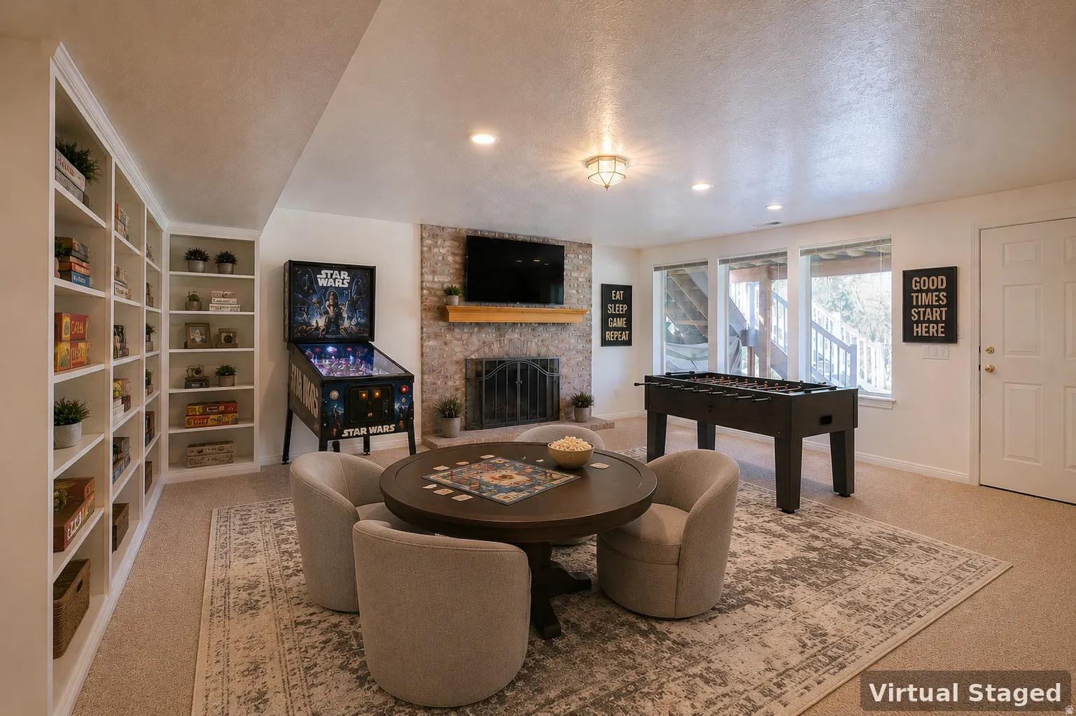 Spacious recreation area featuring extensive built-in shelving, a brick-surround fireplace with a wood mantle, and large windows. Digital Staging.