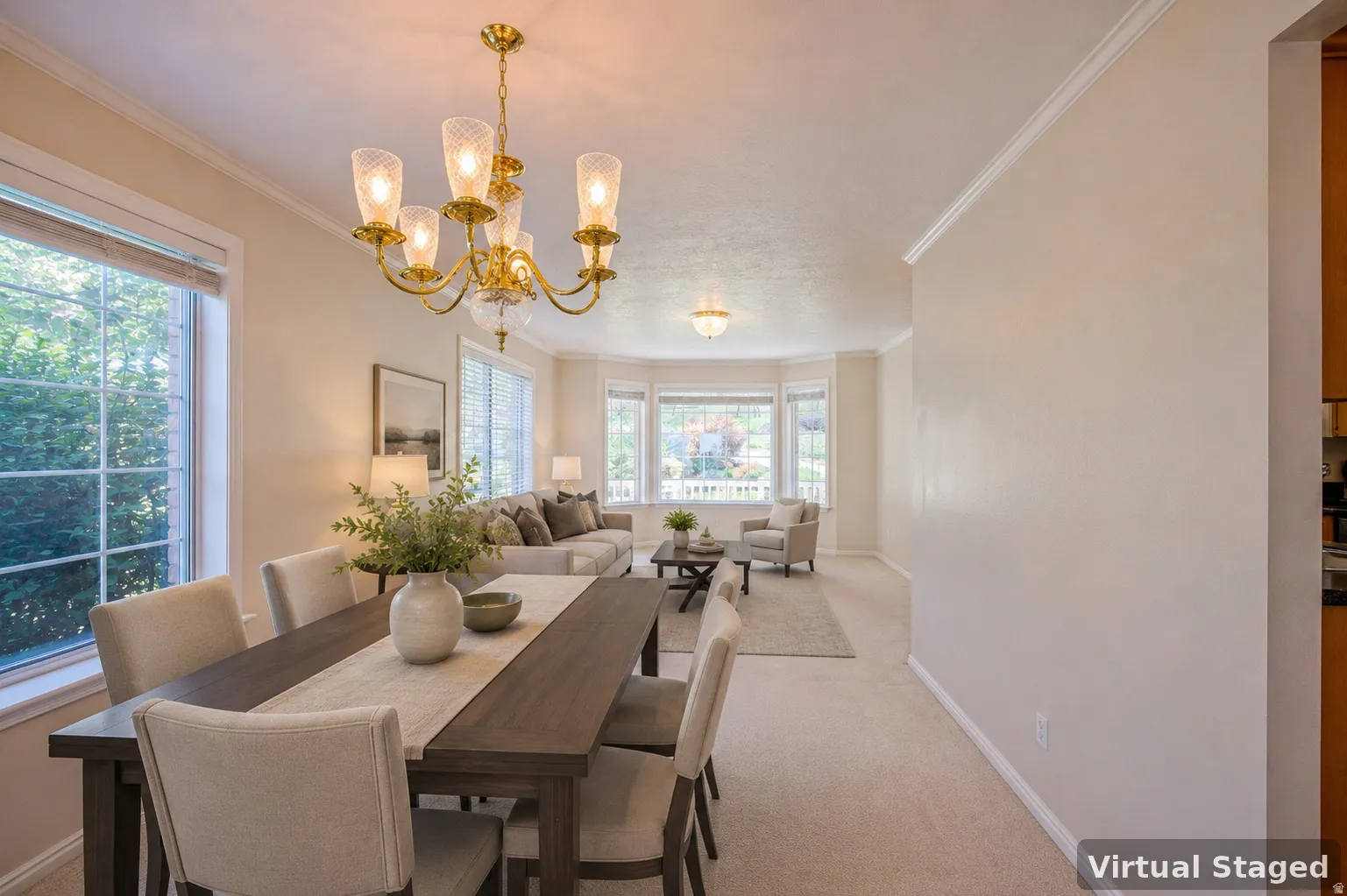Formal dining area with an ornate brass chandelier