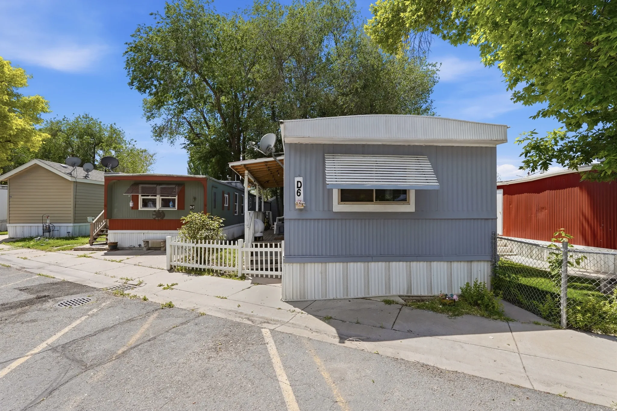 Light blue exterior siding with white trim