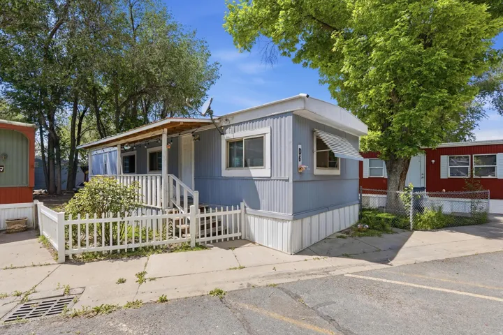 Light blue exterior siding with white trim