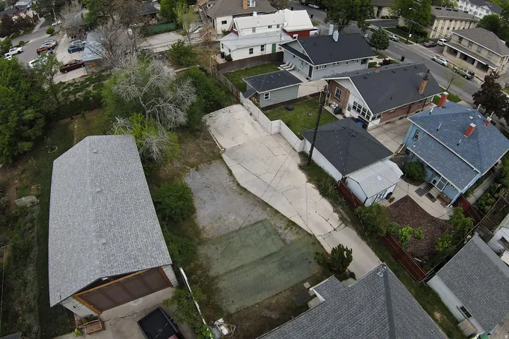 Extensive paved surface area, surrounded by established neighborhood properties