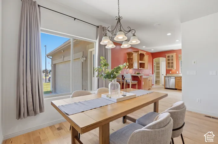 Light wood-finish flooring complements the interior space
