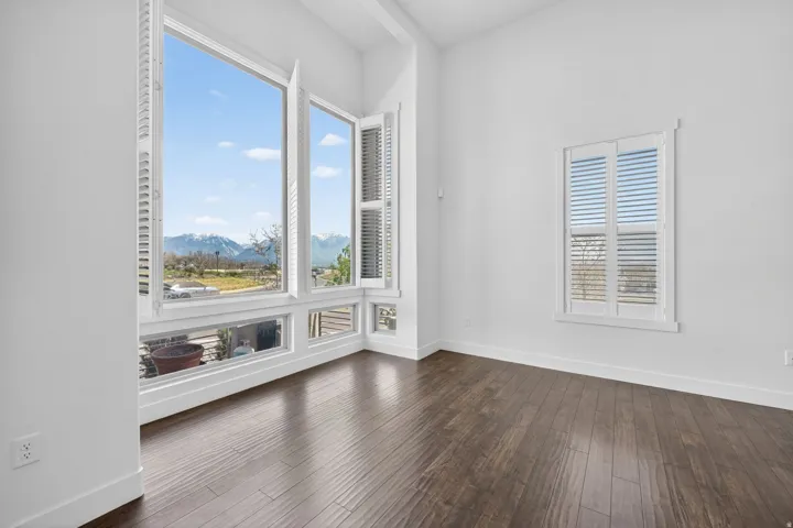 Expansive window wall with mountain backdrop