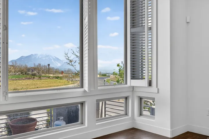 Corner window with white plantation shutters