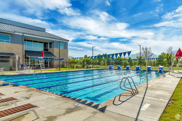 Outdoor lap pool featuring multiple lanes and starting blocks