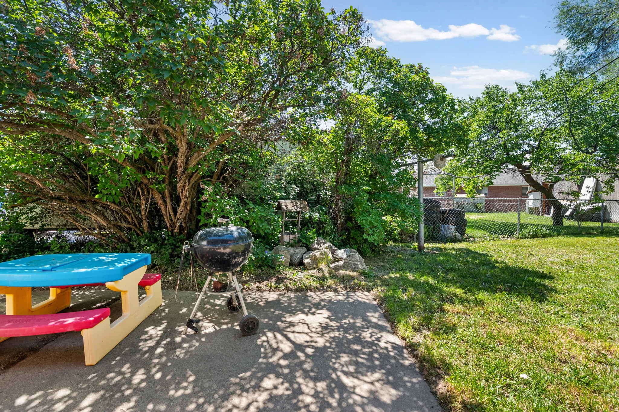 Outdoor patio area featuring a concrete surface