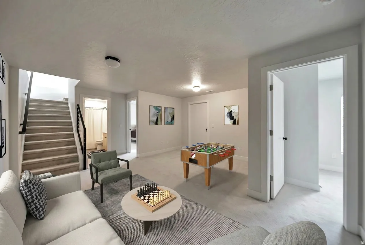 Finished lower level featuring carpeted flooring and recessed lighting