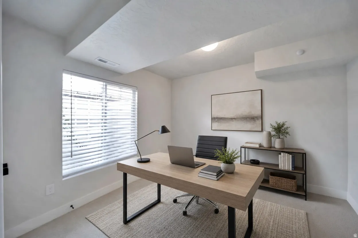 Dedicated room with a window, neutral wall paint, and carpet flooring