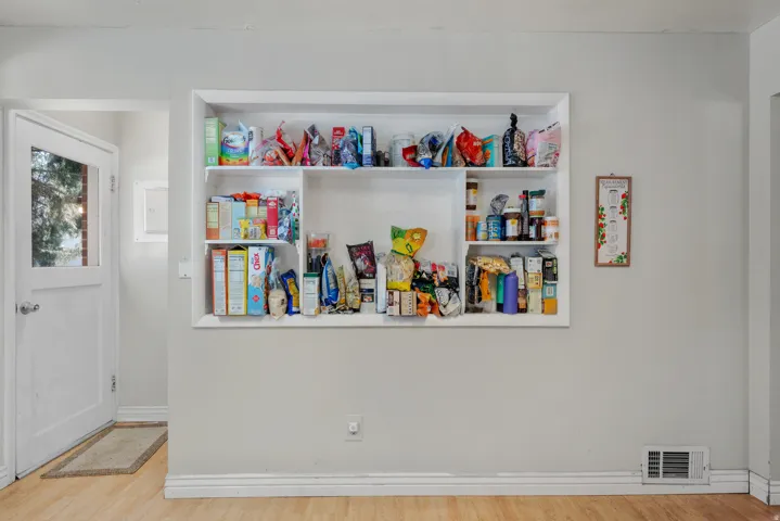 Built-in wall shelving unit offering storage solutions