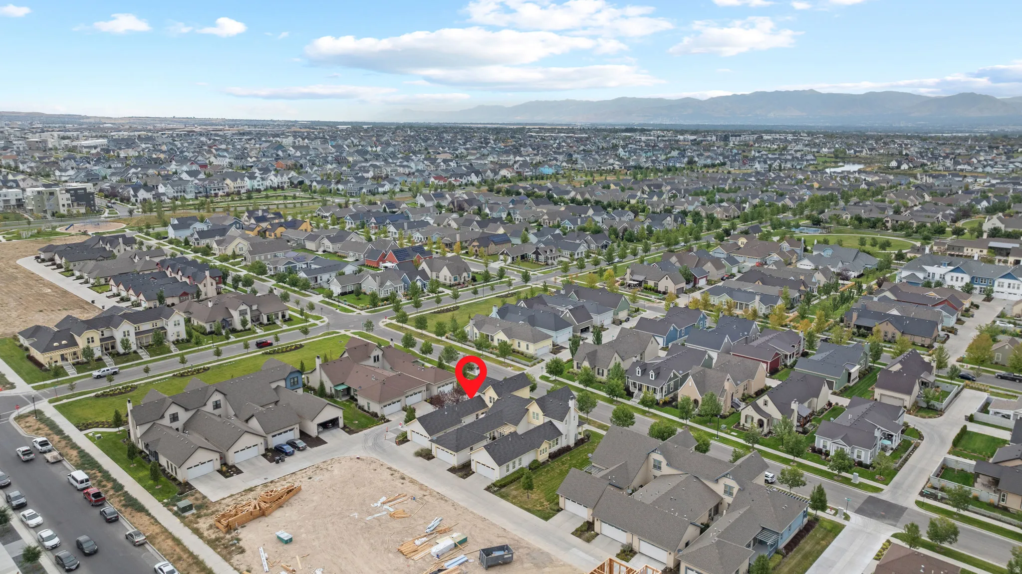 Expansive residential neighborhood featuring a variety of architectural styles, mature street trees, and organized street layouts