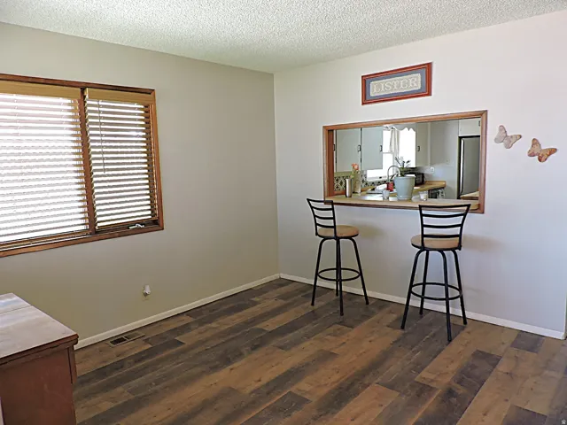 Wood-finish flooring throughout