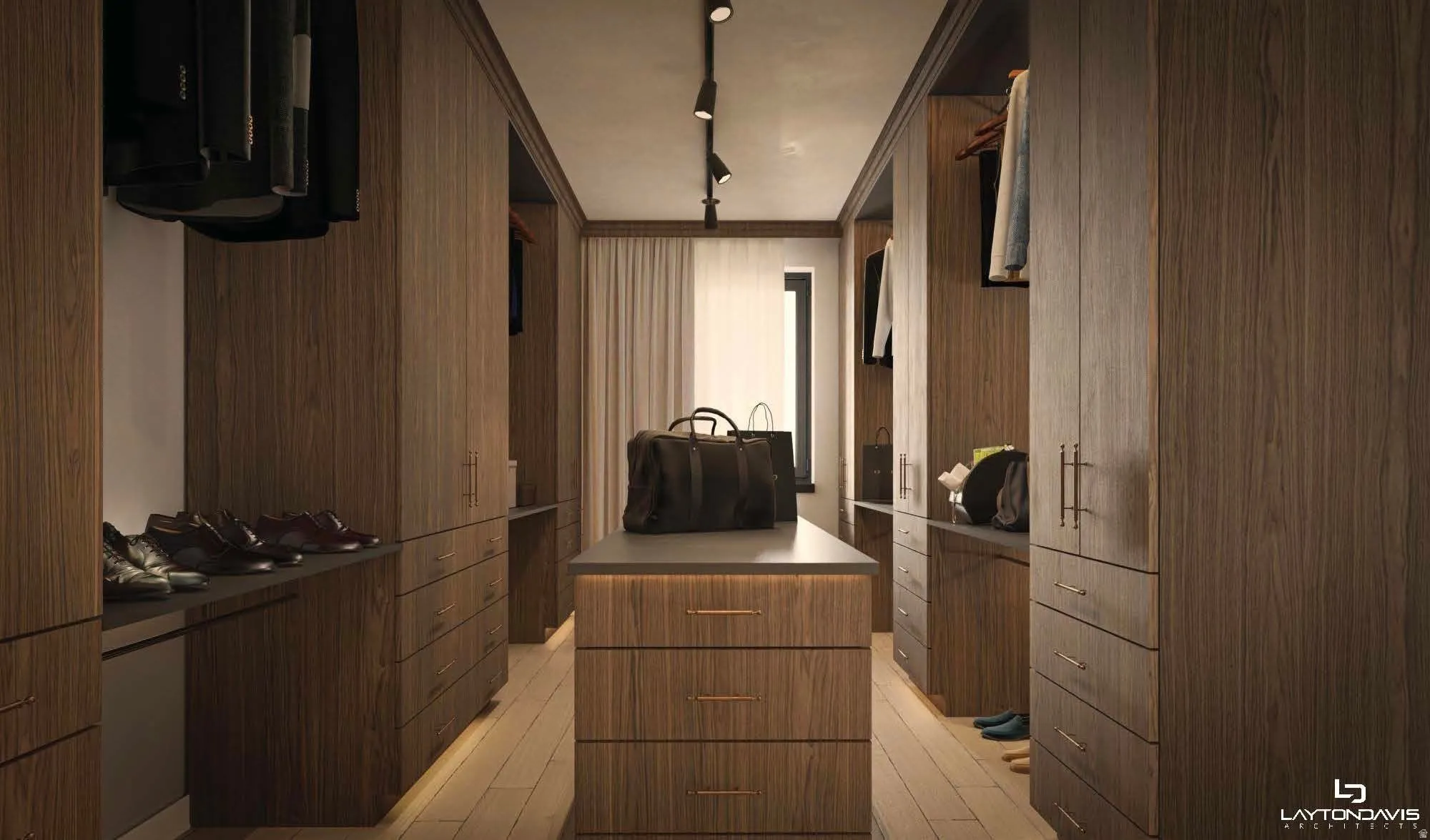Custom walk-in closet featuring extensive built-in cabinetry, wood-finish flooring, and recessed ceiling lighting