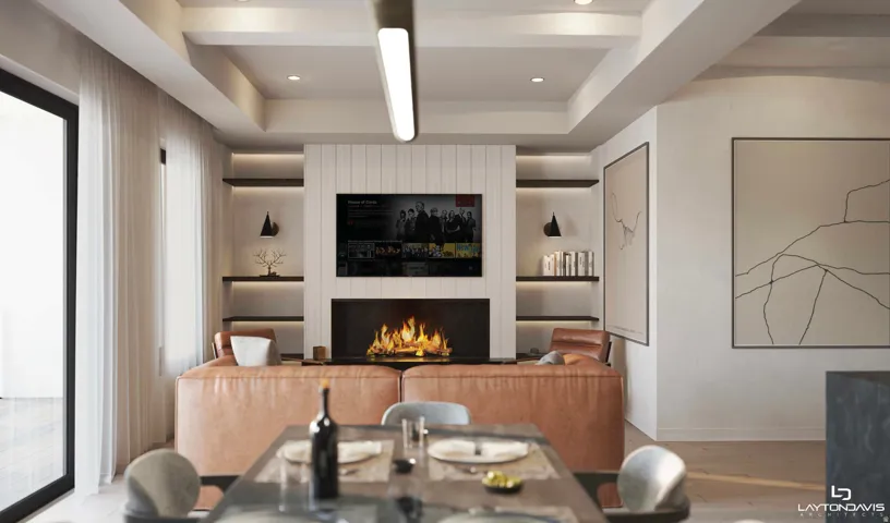Living area featuring a contemporary fireplace with a sleek black surround, integrated shelving with accent lighting, and a tray ceiling with recessed lighting