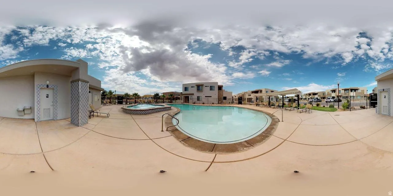 Community swimming pool with an integrated hot tub