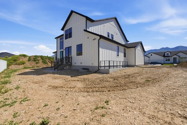 Contemporary board and batten exterior with black trim accents