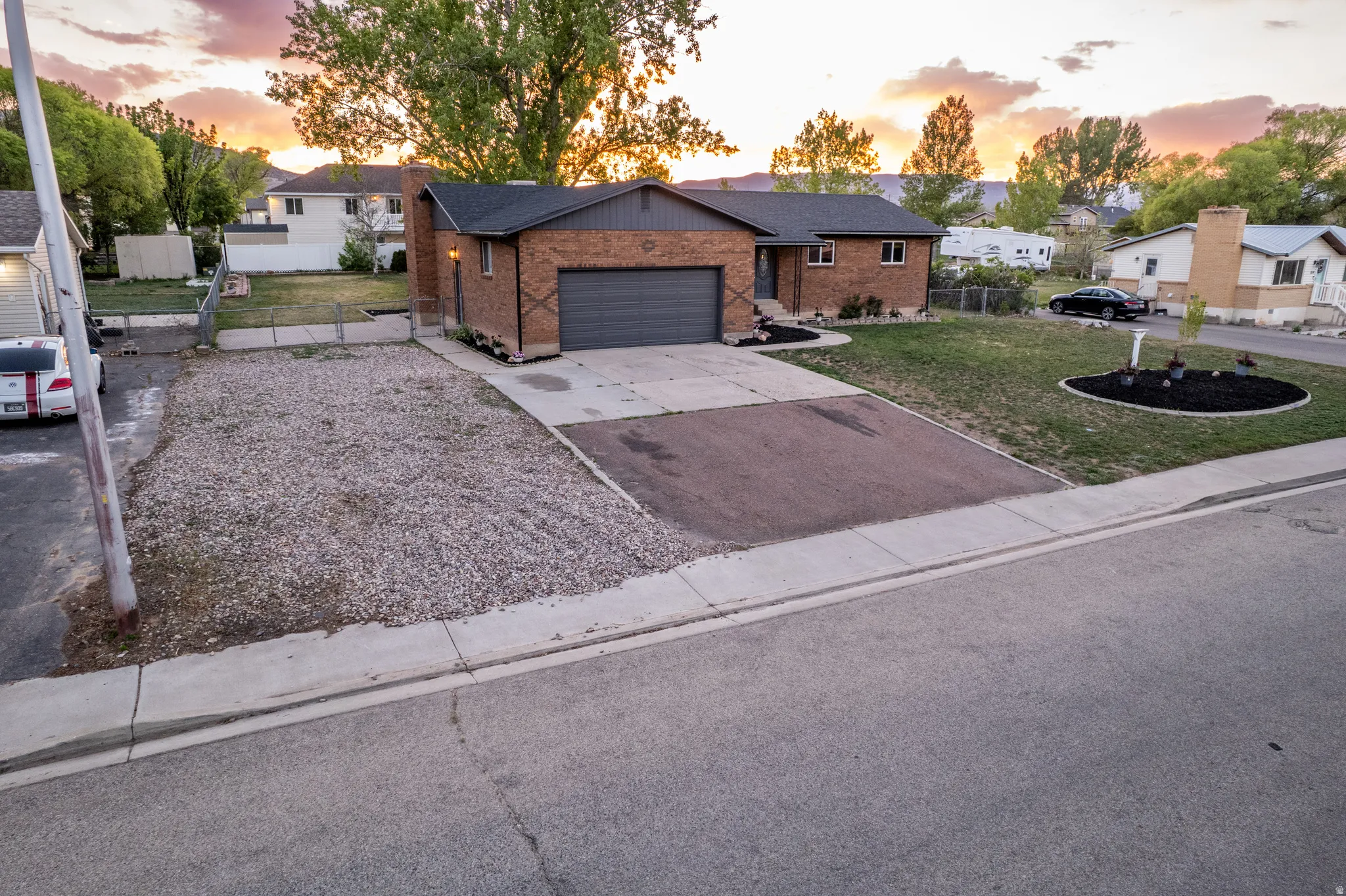 Brick exterior facade with a dark gray garage door
