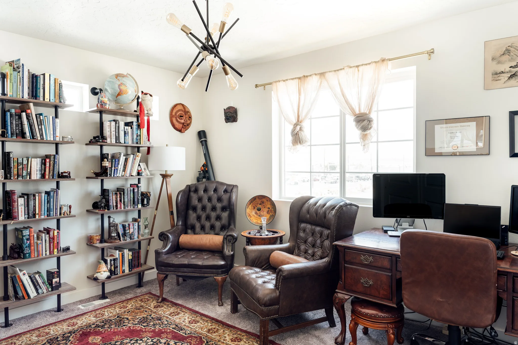 Built-in shelving with wood-finish shelves and industrial-style supports, a large window, recessed window, and a modern multi-bulb ceiling light fixture