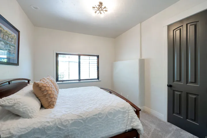 Soft grey carpeting complemented by white walls