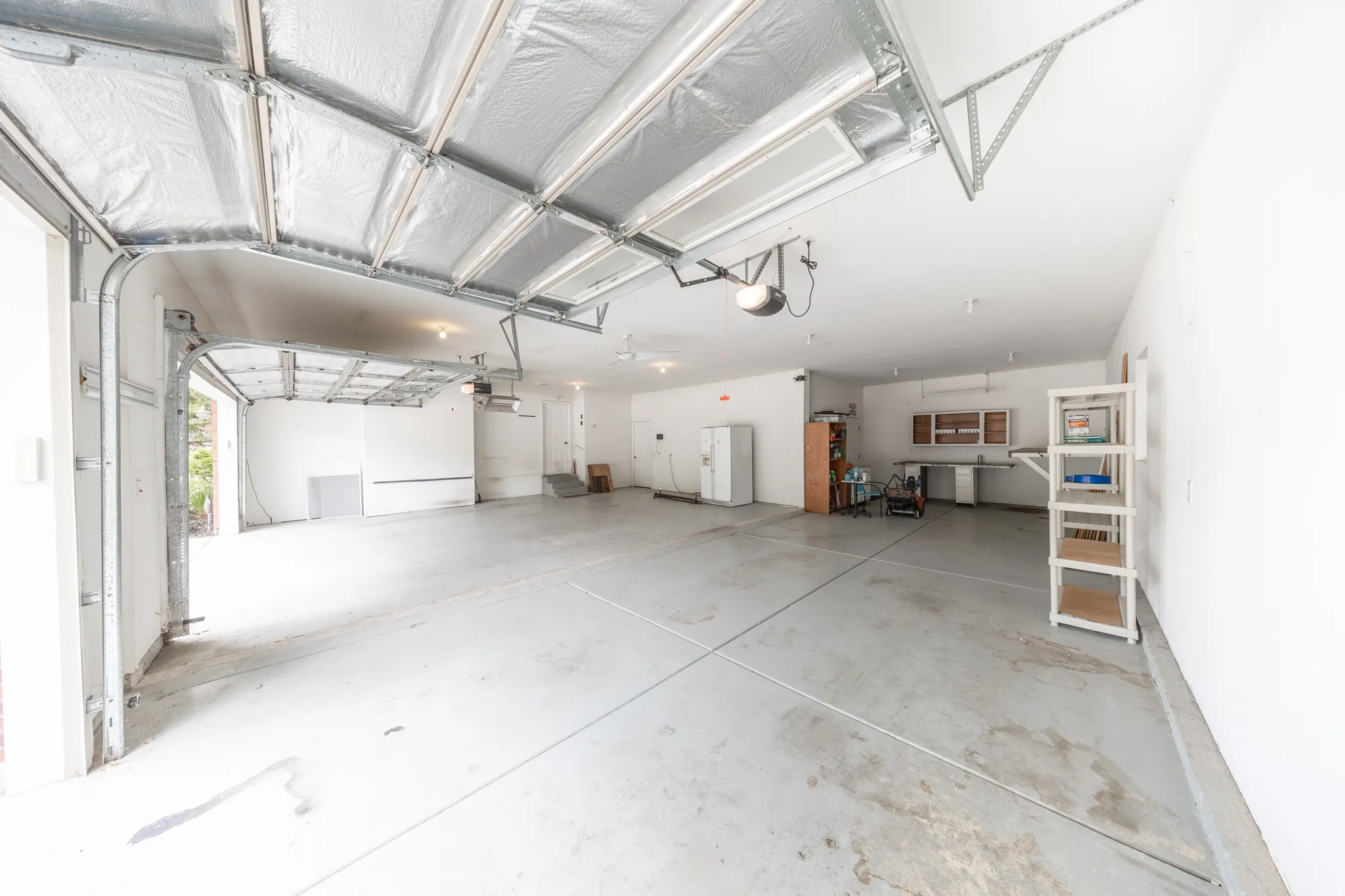 Huge 3 car garage with built in workbench