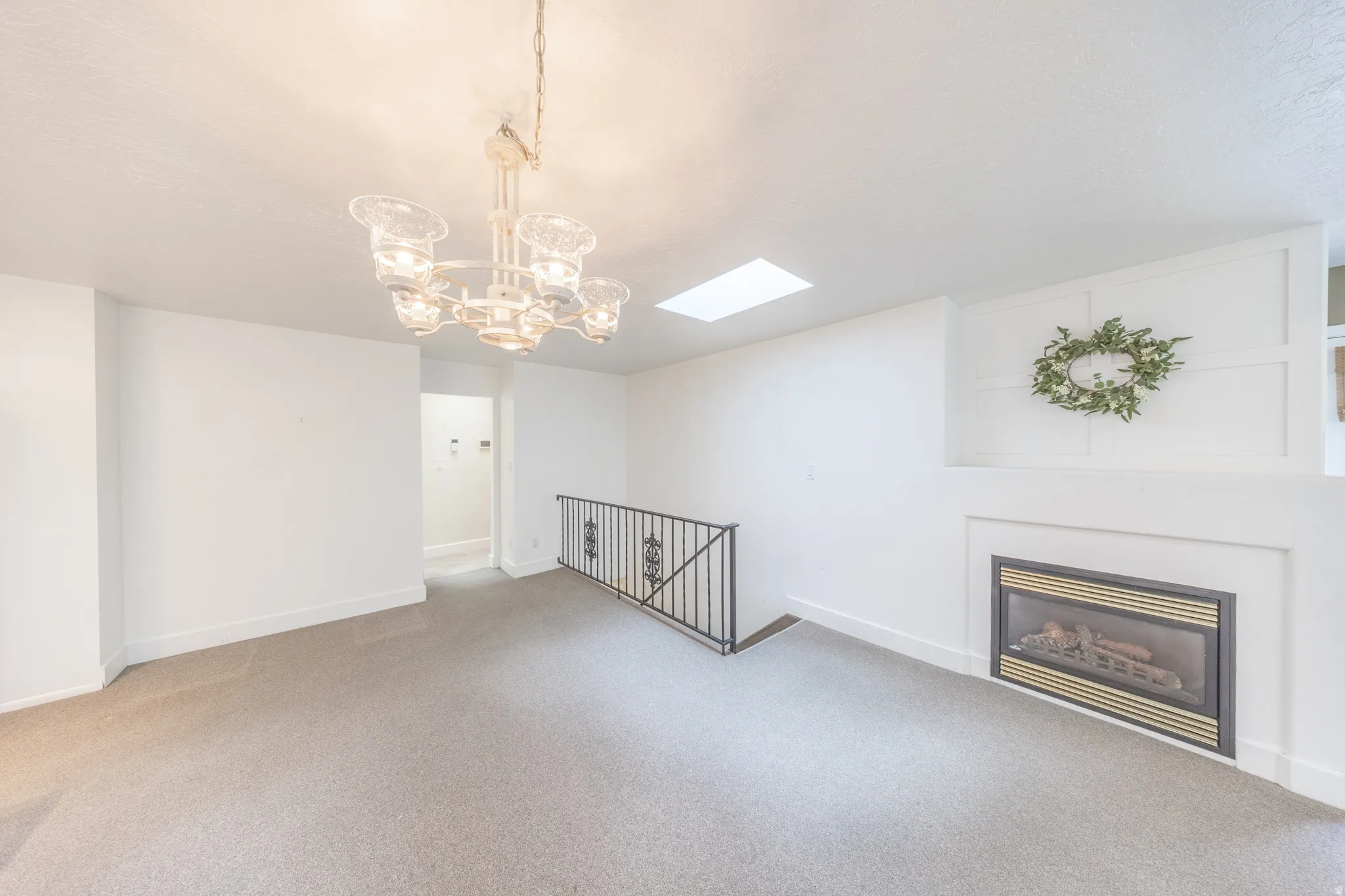 Dining room space with one of 3 fireplaces