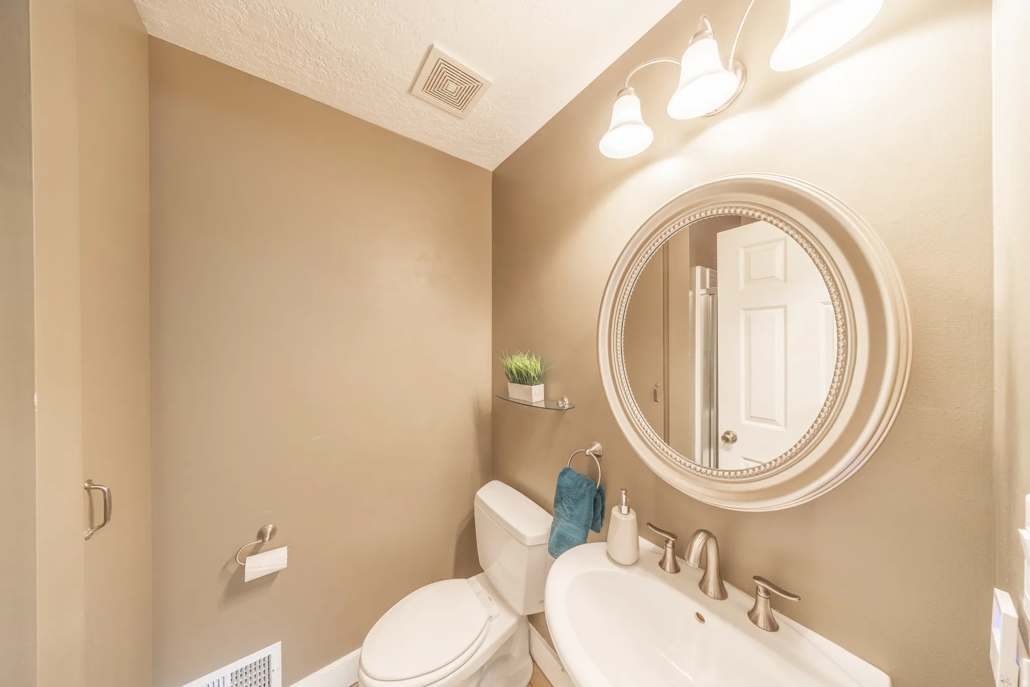 Main floor guest bathroom with shower