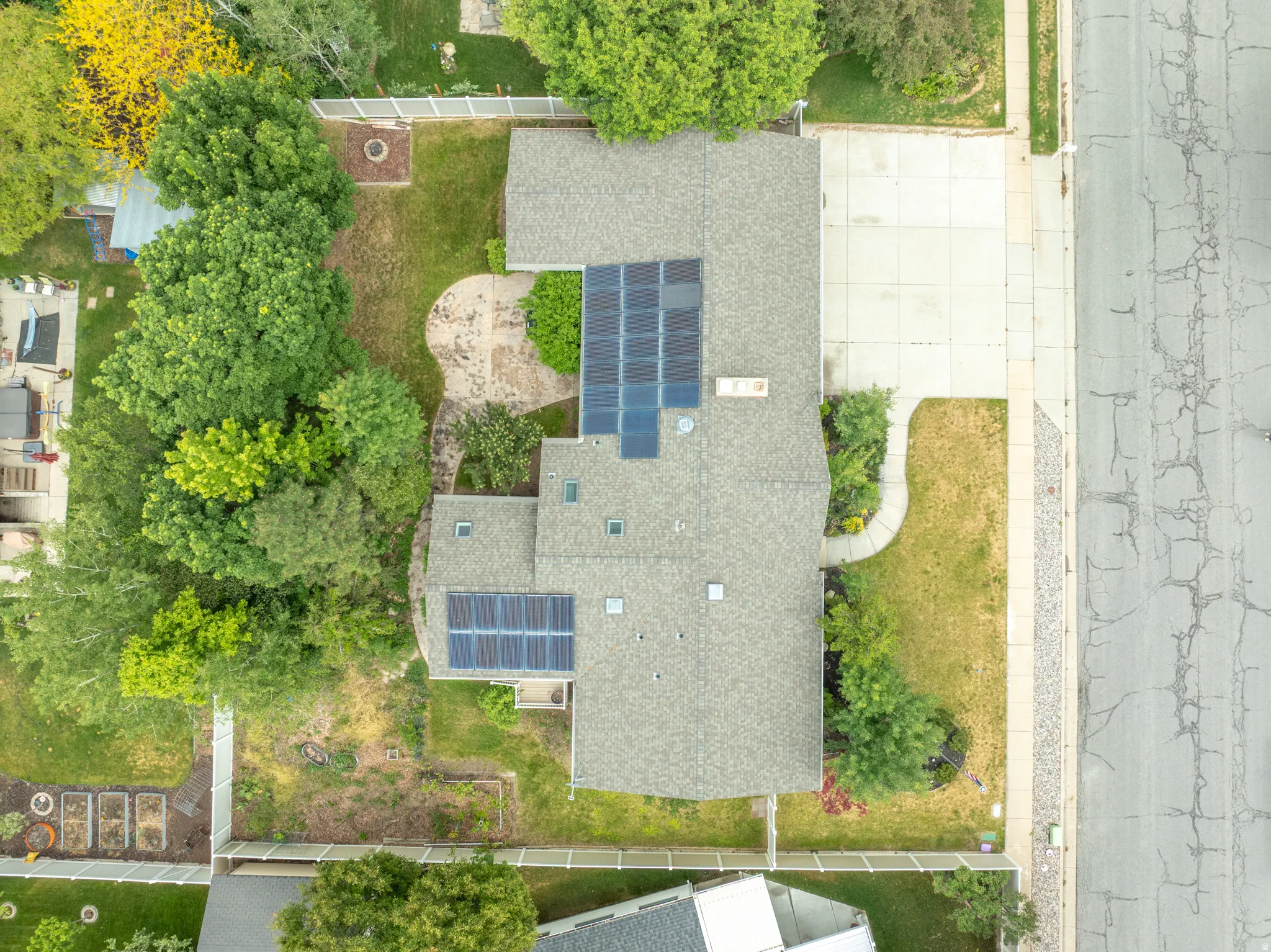 Aerial with view of property and solar panels