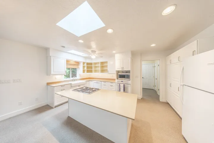 Pantry wall - built in wall oven, farmhouse sink