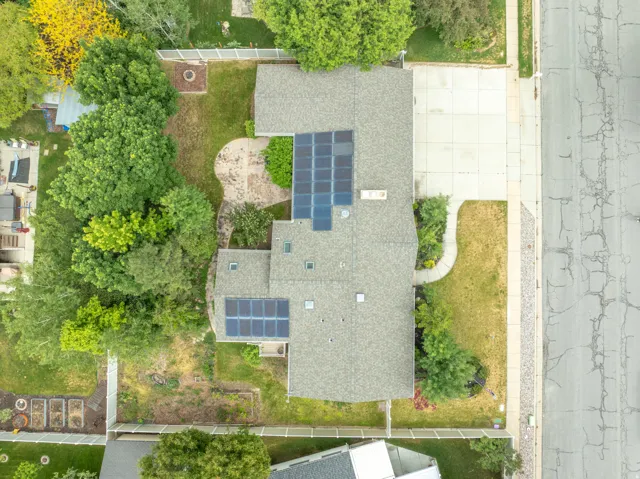 Aerial with view of property and solar panels