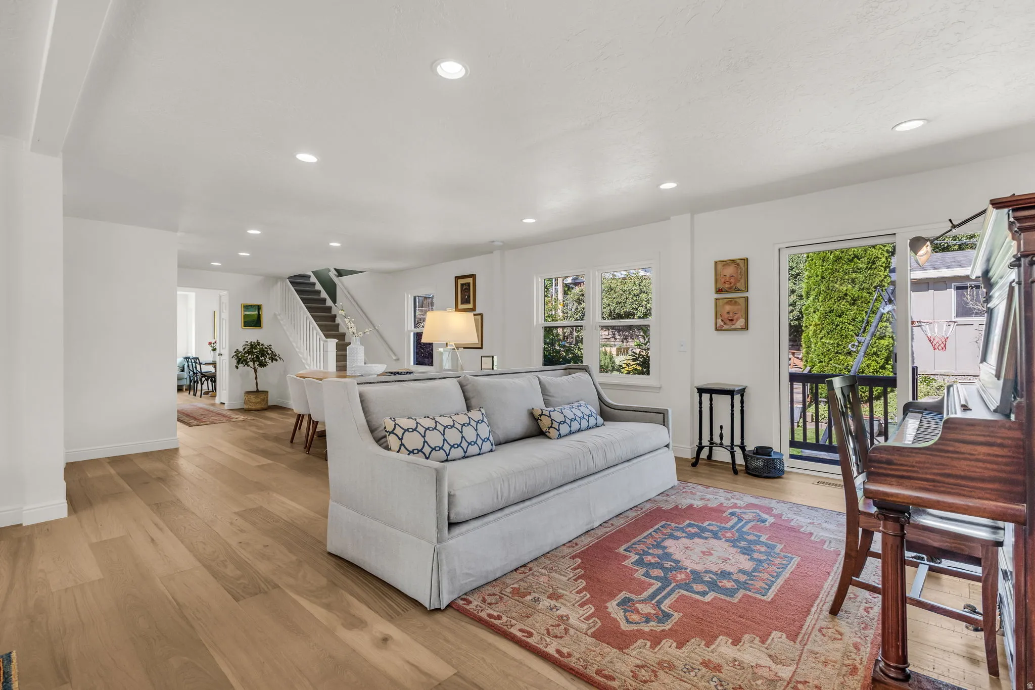 Spacious open-concept living room with natural light