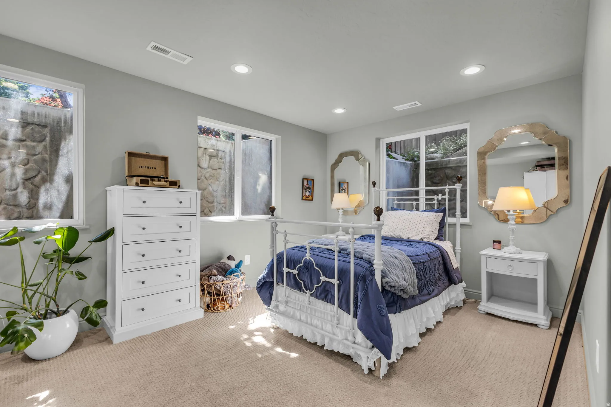 Basement bedroom with light-filled windows