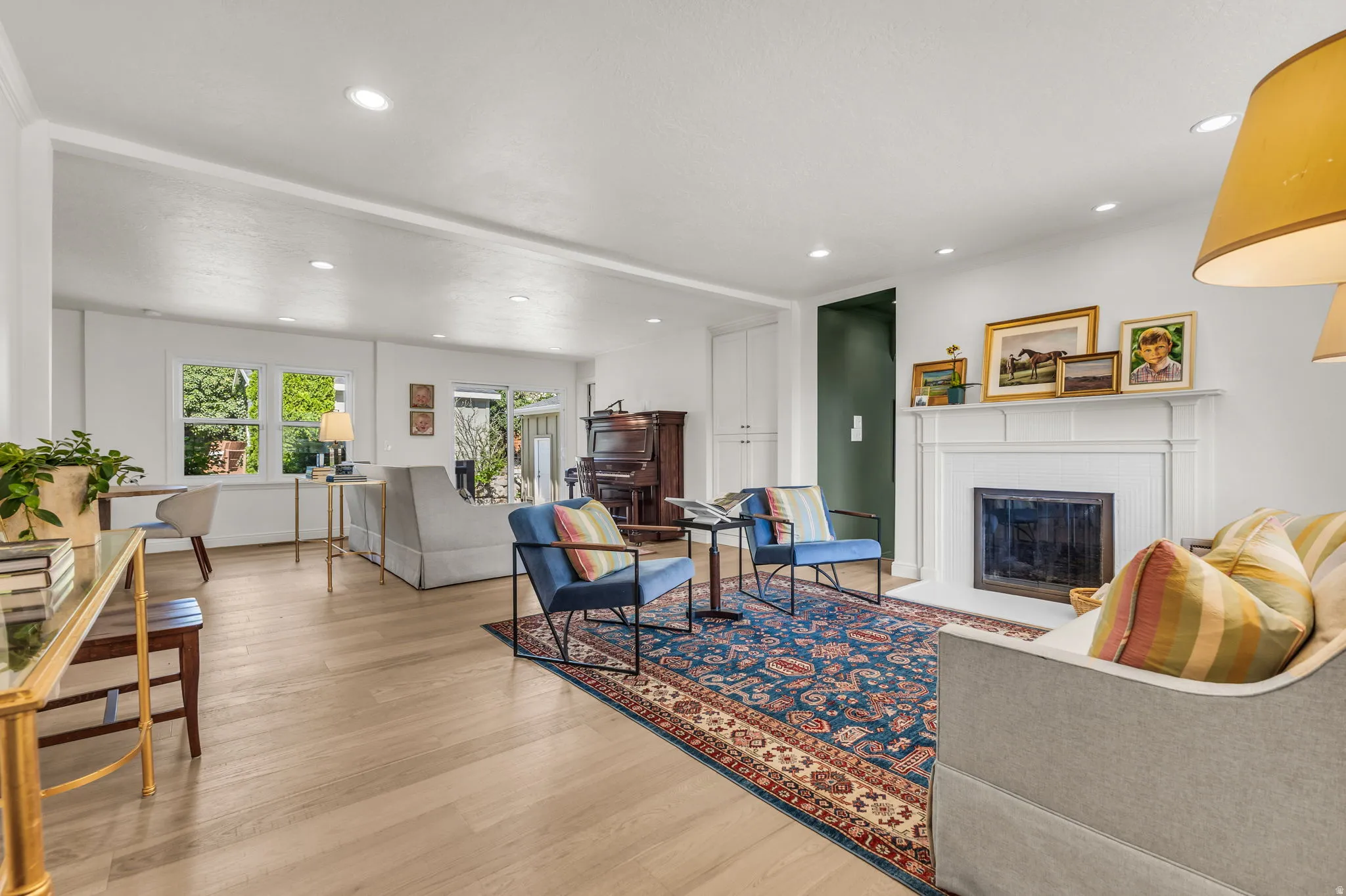 Spacious open-concept living room with natural light