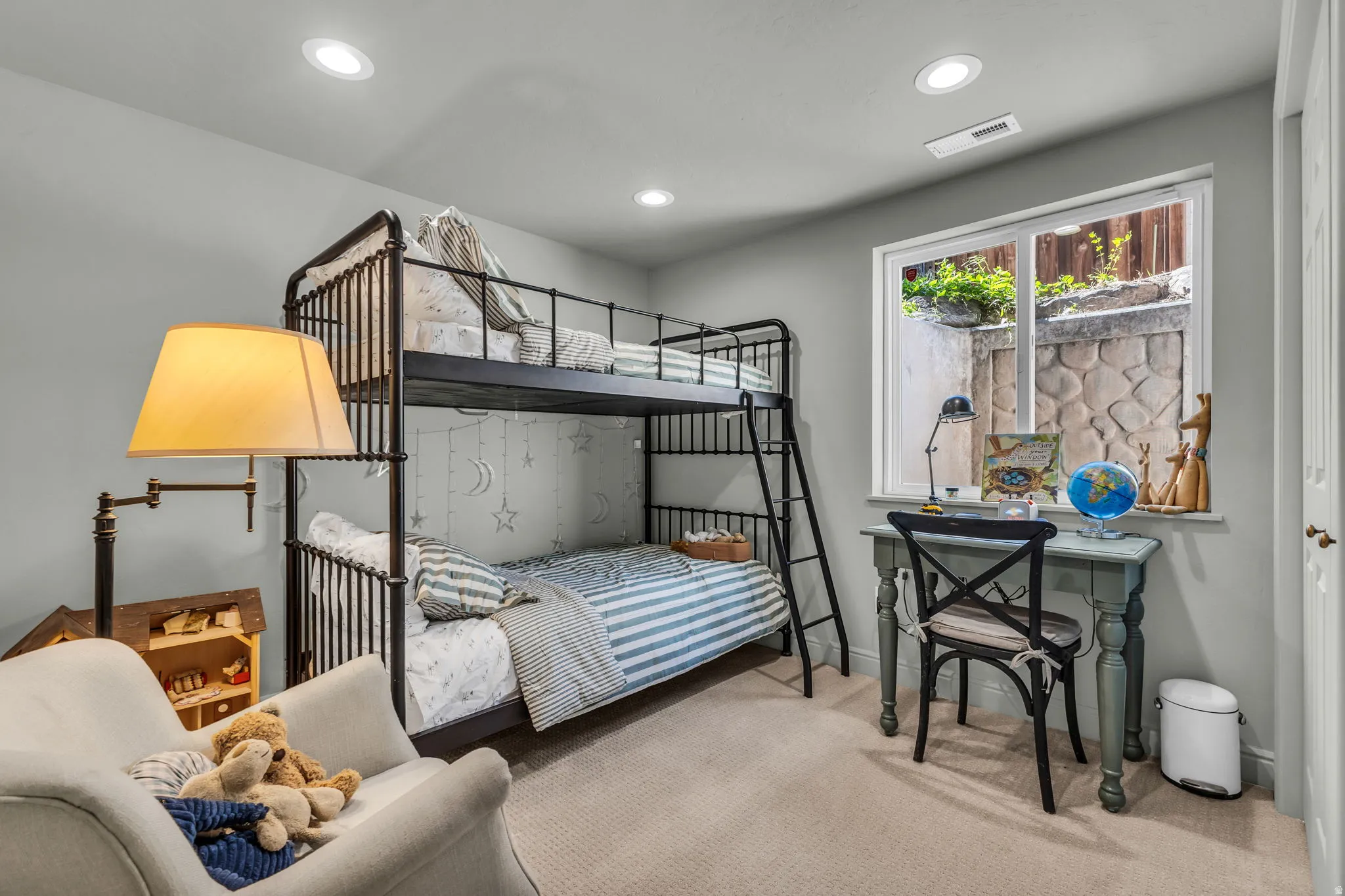 Basement bedroom with light-filled windows
