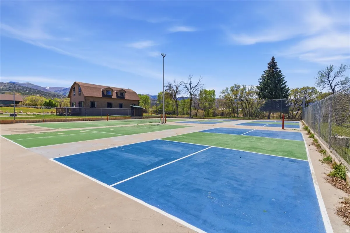 Multi-sport court featuring blue and green playing surfaces