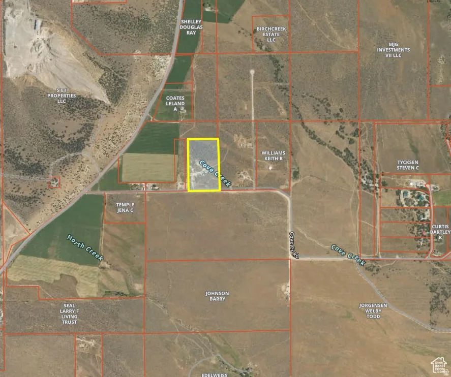 Aerial overview of property's location featuring property parcel outlined