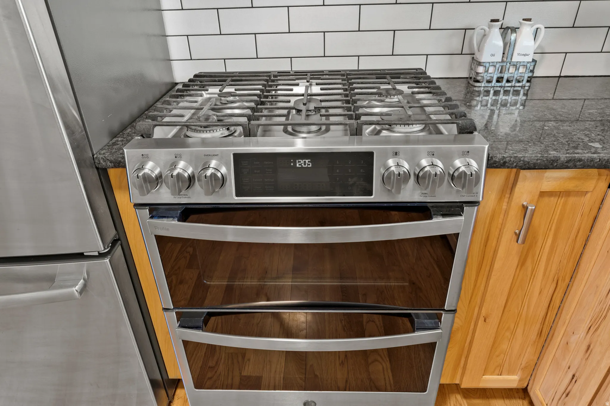 Stainless steel gas range with a double oven and digital display