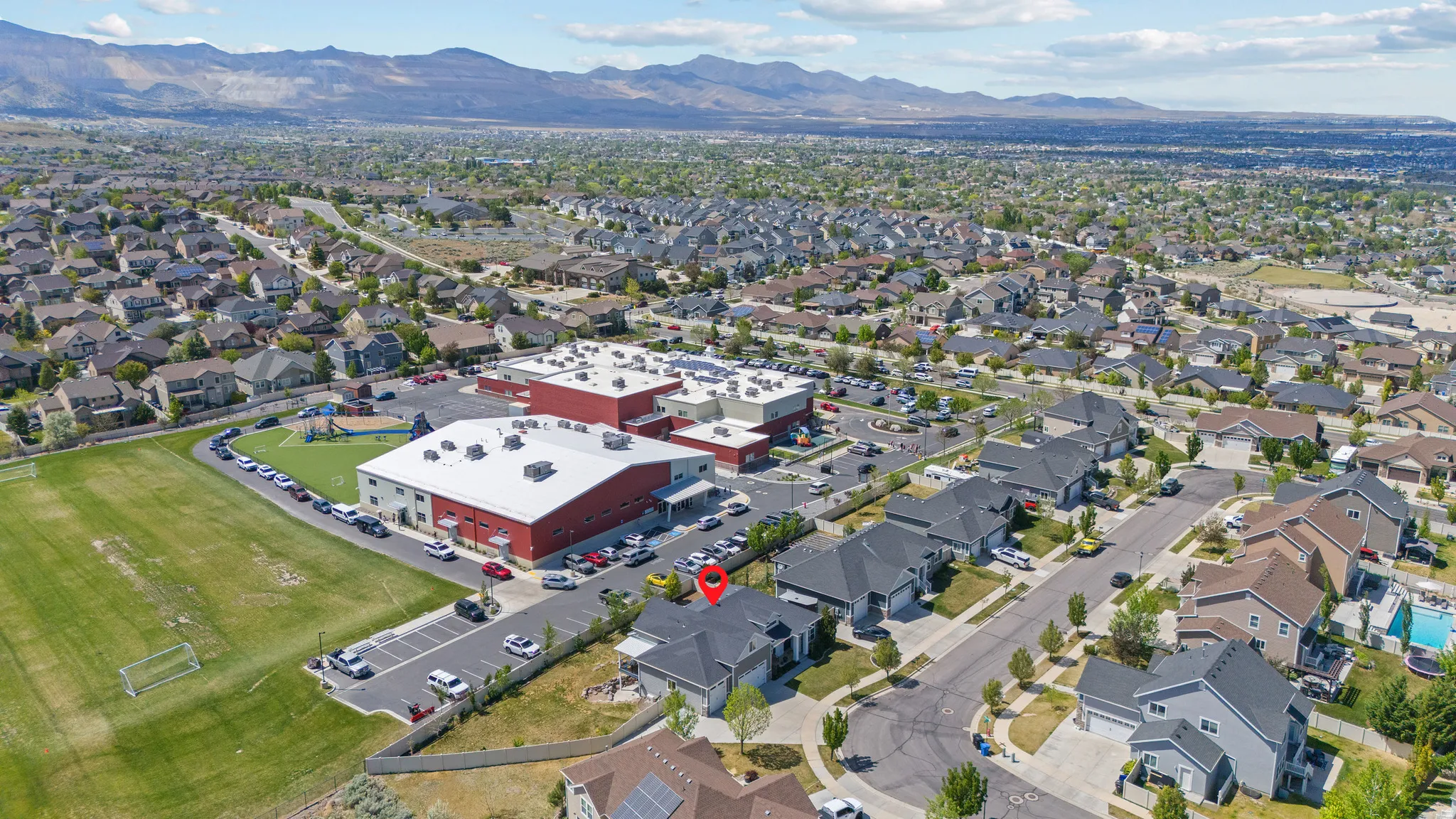 Aerial perspective showcasing a residential development with varied housing styles