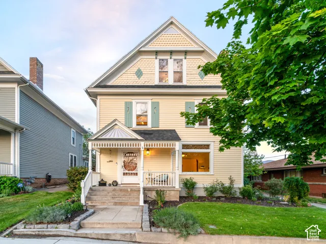 Two-story residence with a covered front porch and a gabled roofline