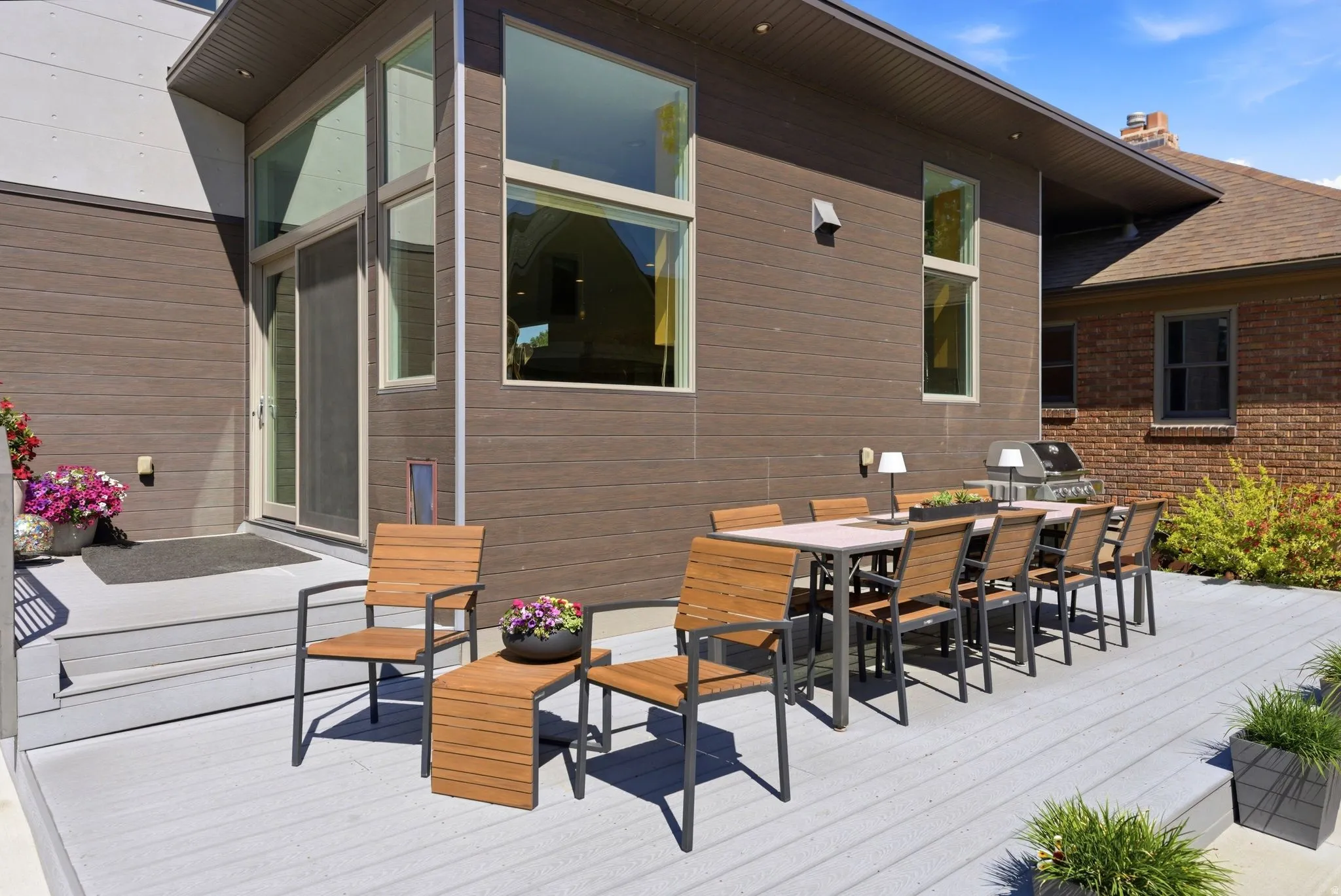 Spacious exterior deck with light grey decking