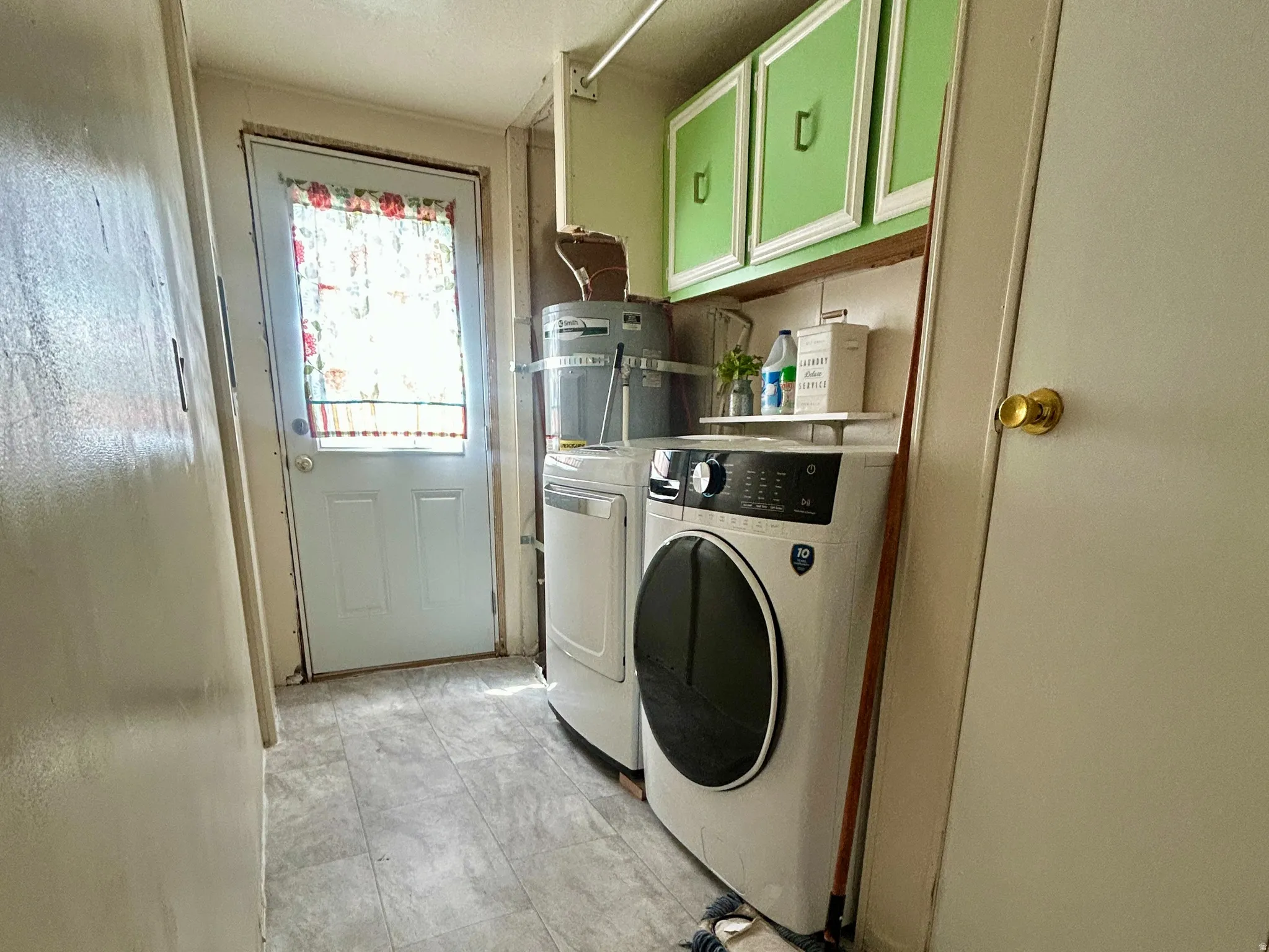 Laundry Area with door access to the back yard