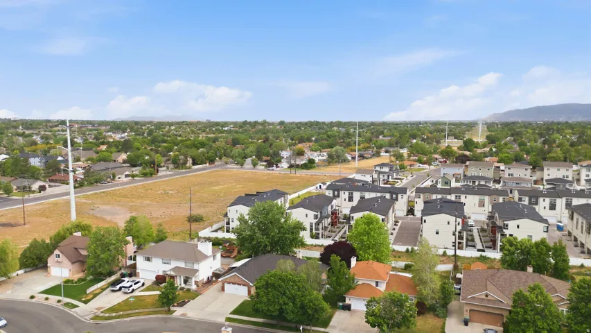 Aerial perspective showcasing a residential community with diverse property types