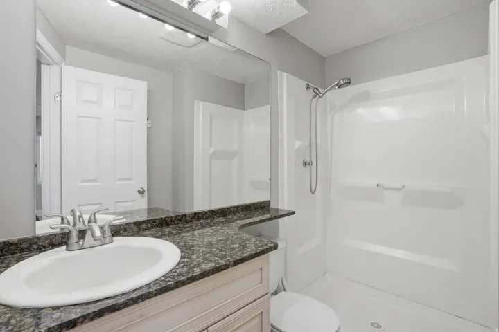 Private Bath on one of the bedrooms in the basement.